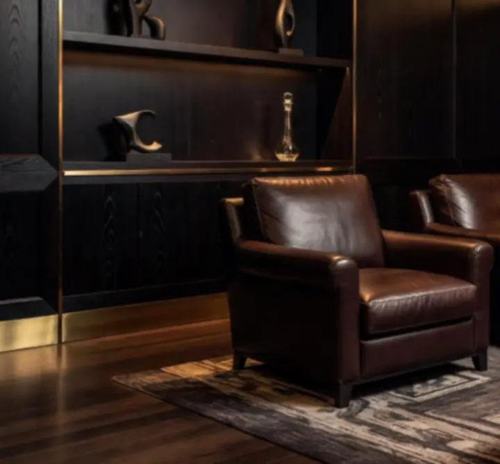 Détail du design intérieur du lounge avec matériaux nobles et éclairage chaleureux